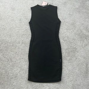 Brand New Missguided Black Dress in a size 0 but fits a 2/4.